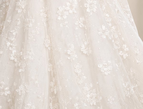 Beaded tulle skirt with flower appliqué, close detail
